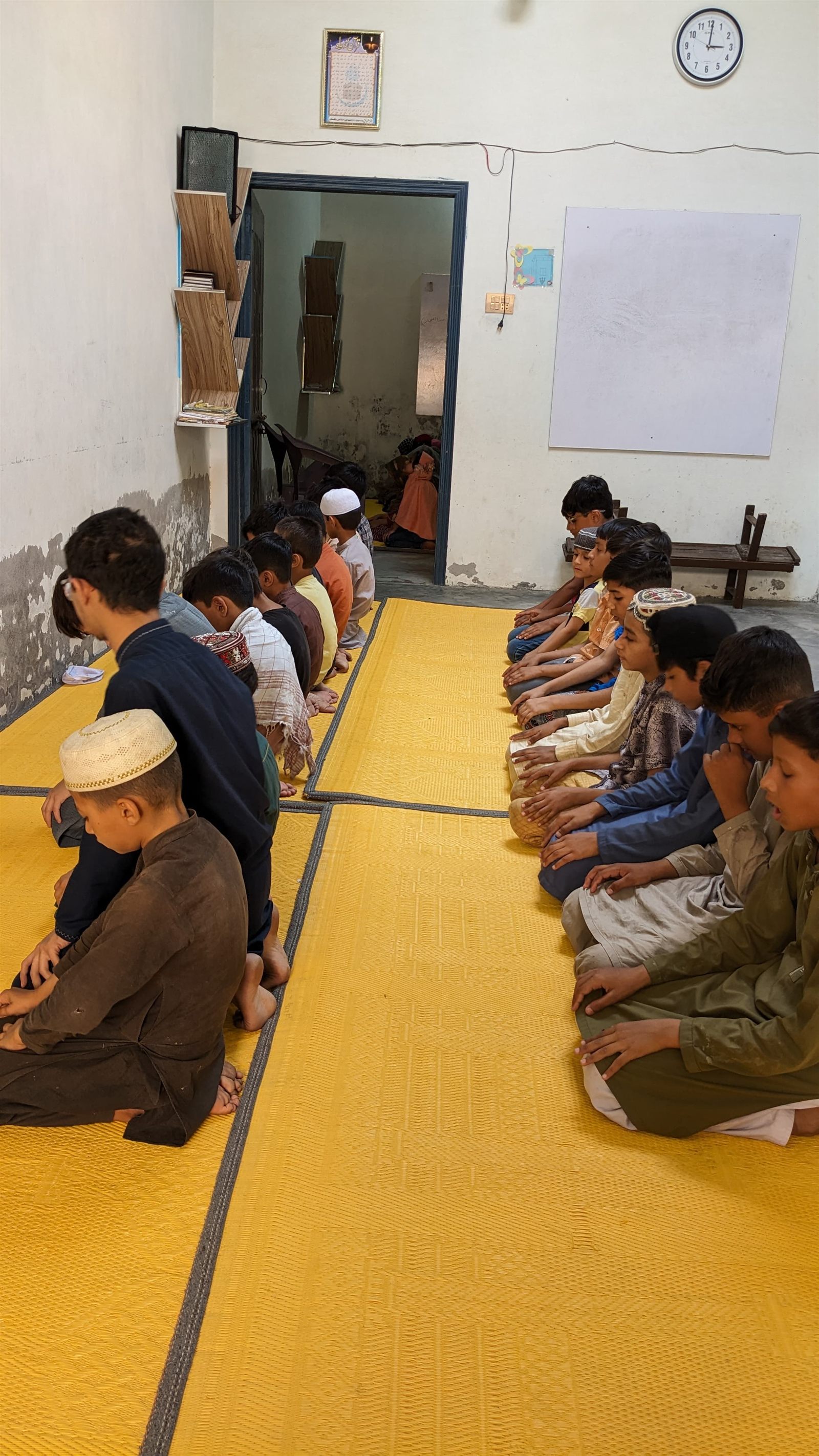 Boys learning session at Al Mus'haf
